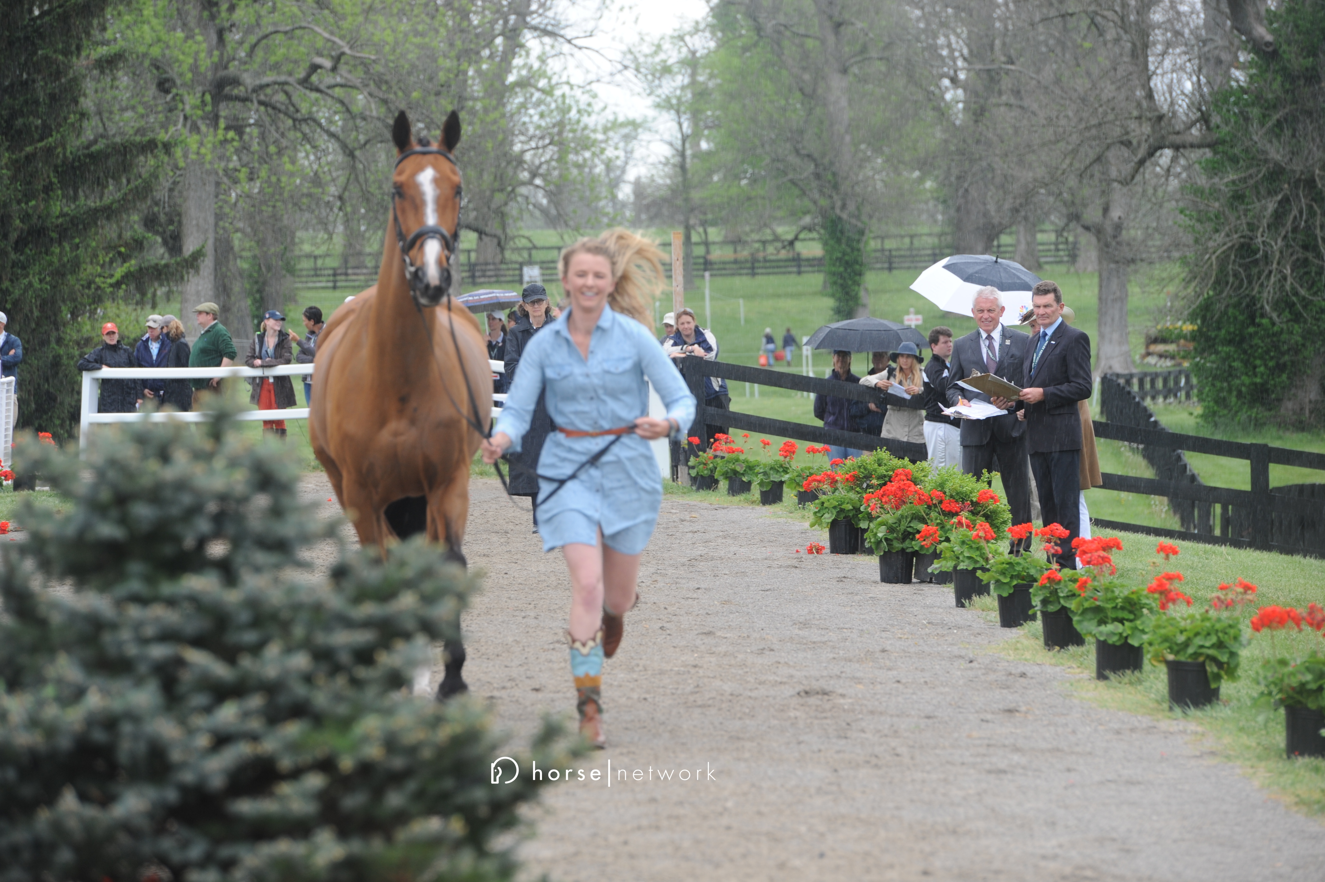 Rolex Rooks Avery Klunick and the aptly named In It To Win It, who looks a little suspicious of that shrub ahead.